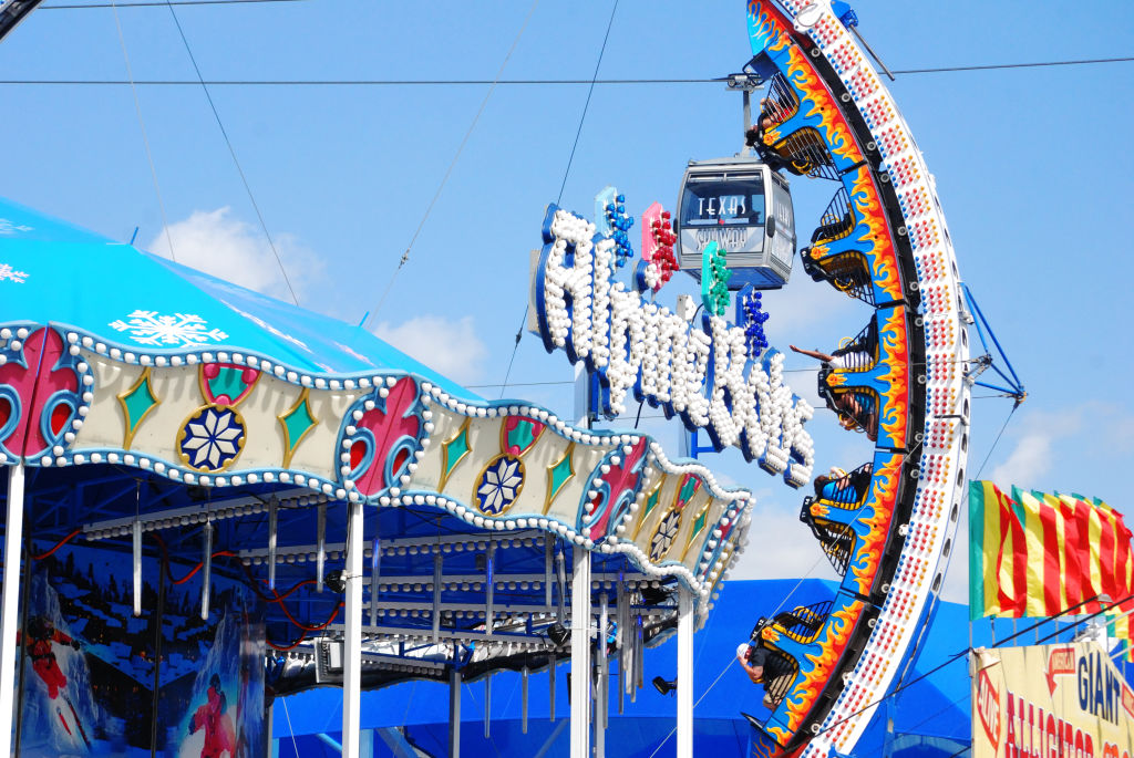 Amusement park rides on the midway at the Texas State Fair